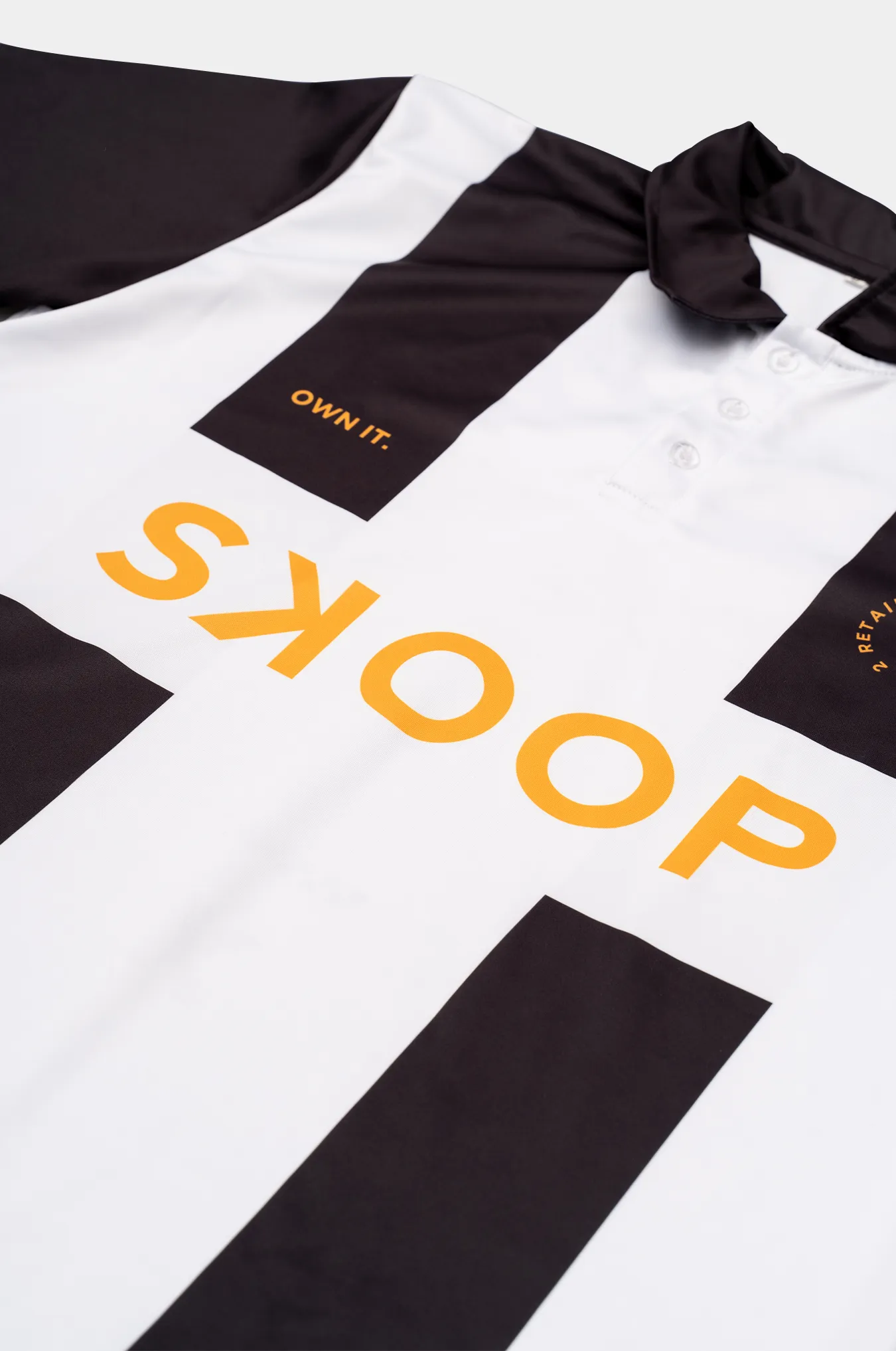 SKOOP® Retail Therapy Caged Polo