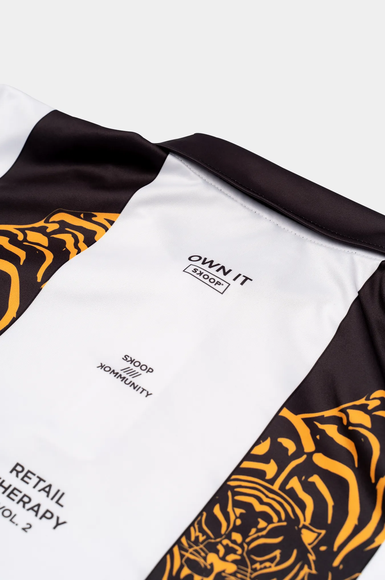 SKOOP® Retail Therapy Caged Polo